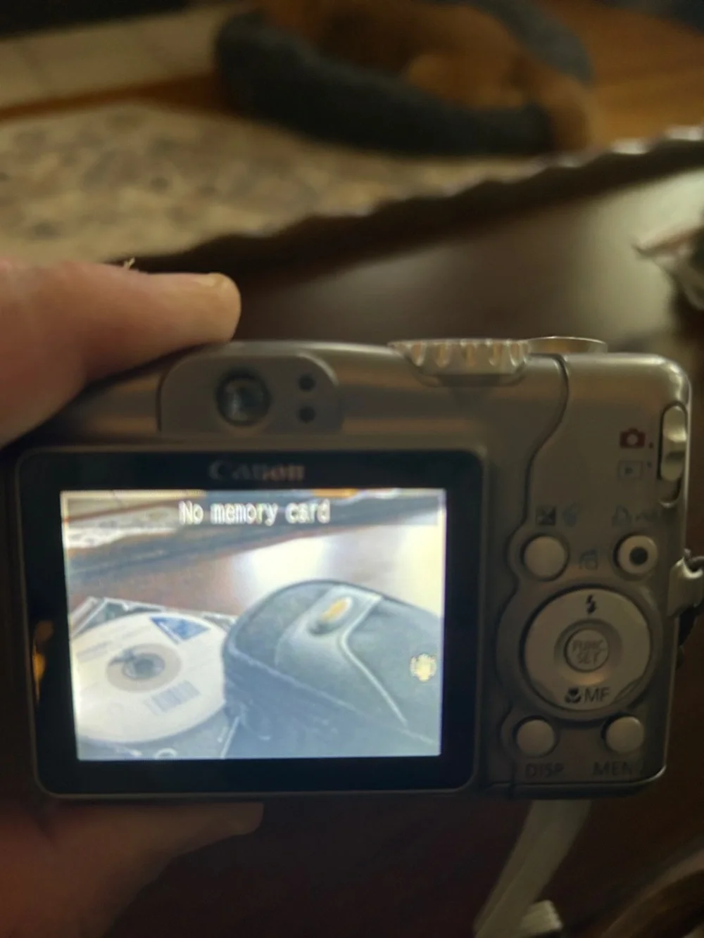 Canon Silver A710 Point-and-Shoot Digital Camera with Black Case and Cable